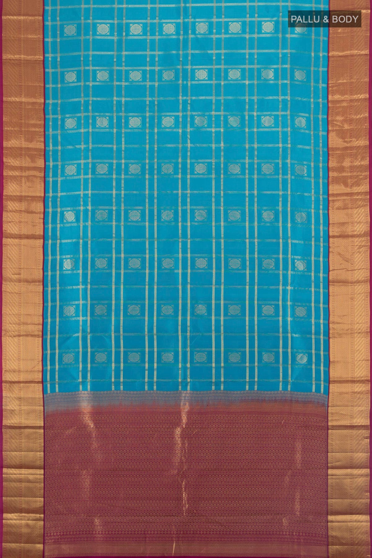 Flat view of Pure Silk Light Blue Kanchipuram Saree with Checked design on the body and Zari Border. 