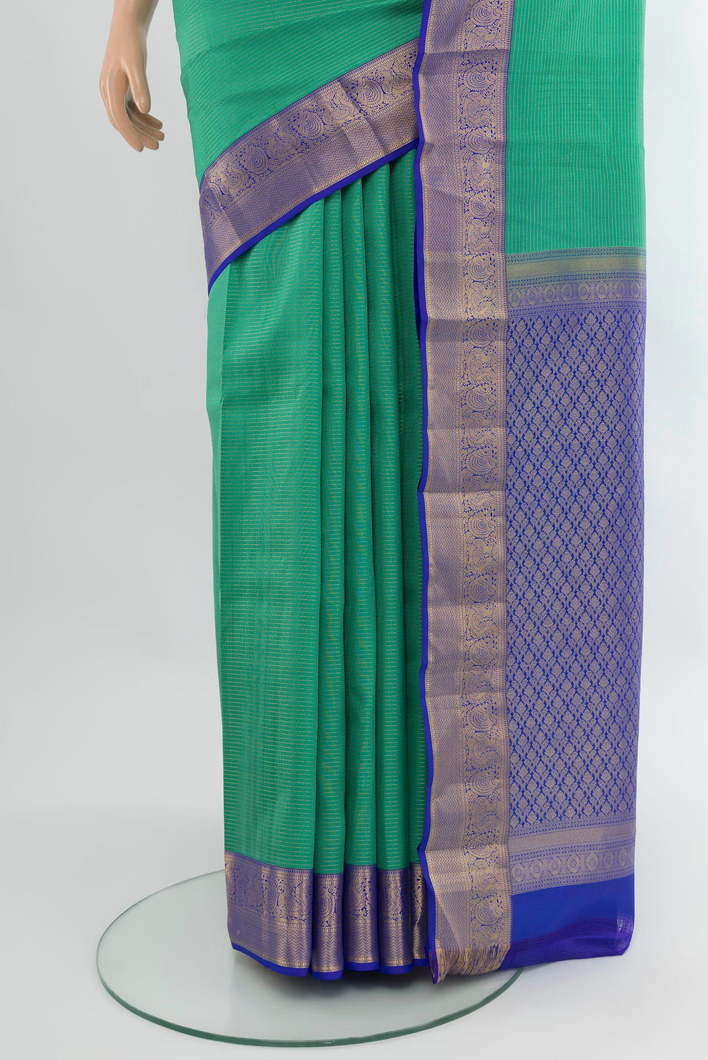 Pleats and pallu of Sea Green Kanchipuram Silk Saree with Stripes on the body and Zari Border. 