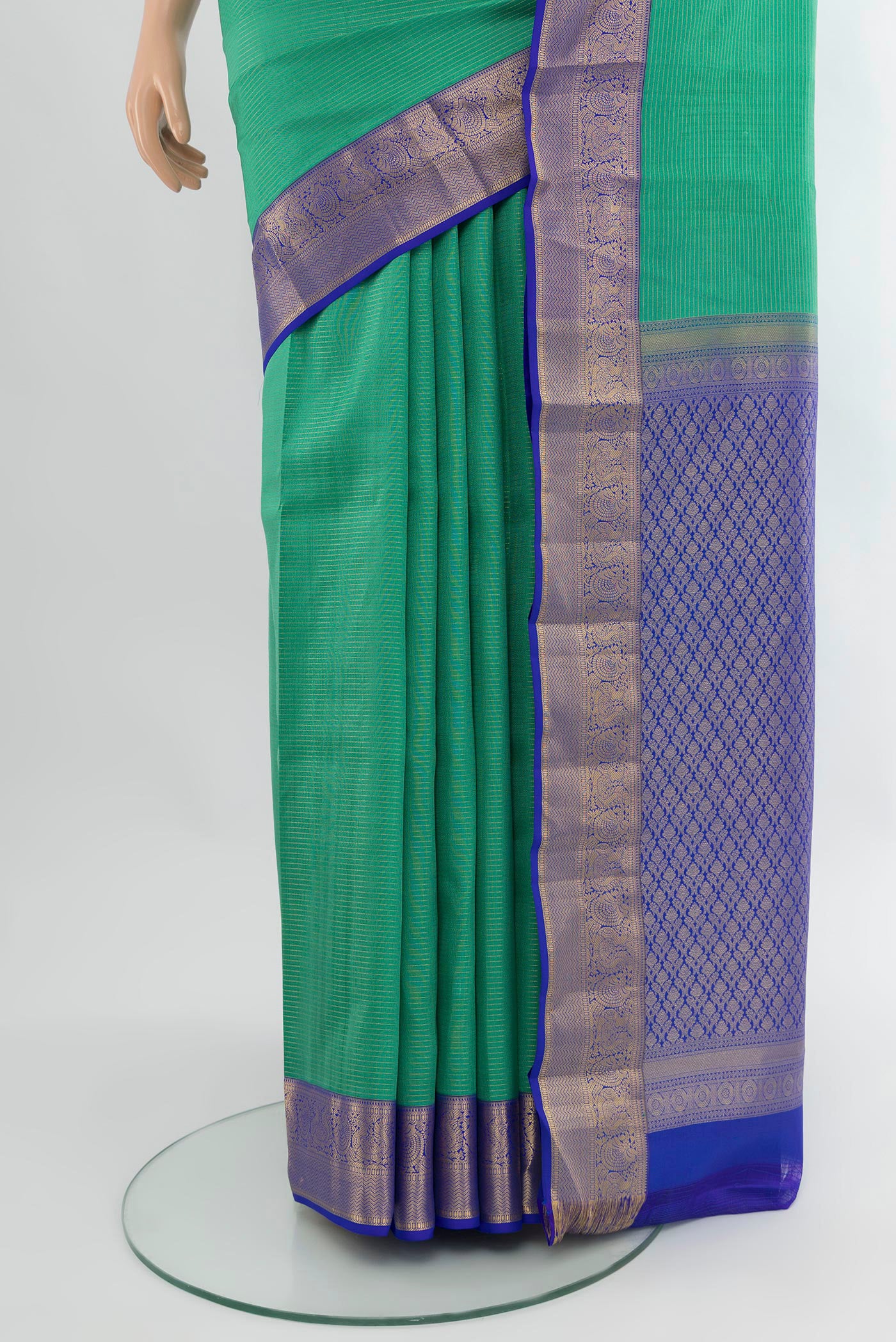 Pleats and pallu of Sea Green Kanchipuram Silk Saree with Stripes on the body and Zari Border. 