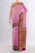 Pure Silk Rose pink Kanchipuram Saree with Zari Butta on the body and Zari Border.  displayed on a mannequin