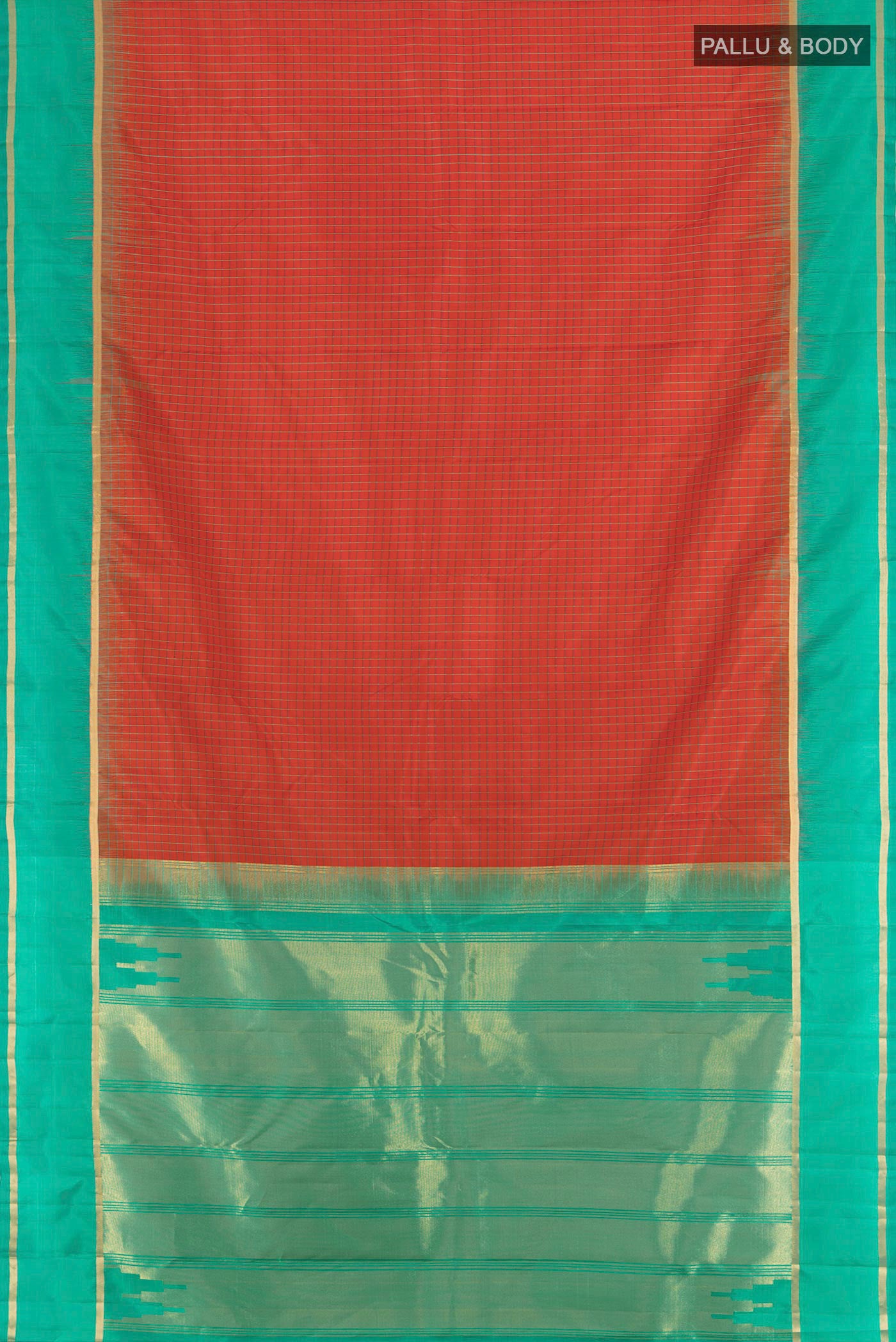 Flat view of Rust Kanchipuram Silk Saree with Checked design on the body and Plain Border. 