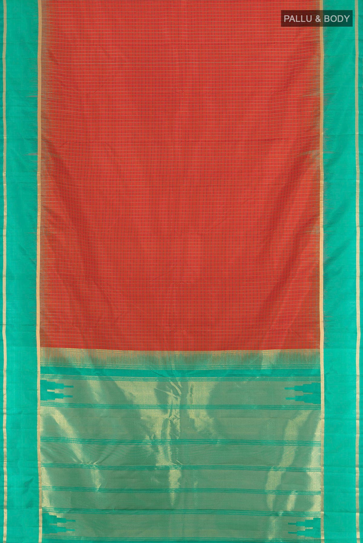 Flat view of Rust Kanchipuram Silk Saree with Checked design on the body and Plain Border. 