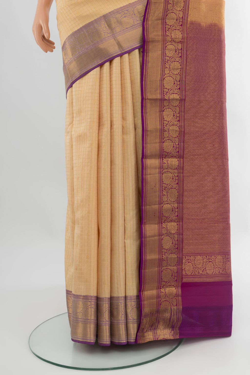 Pleats and pallu of Sandal Kanchipuram Silk Saree with Checked design on the body and Zari Border. 