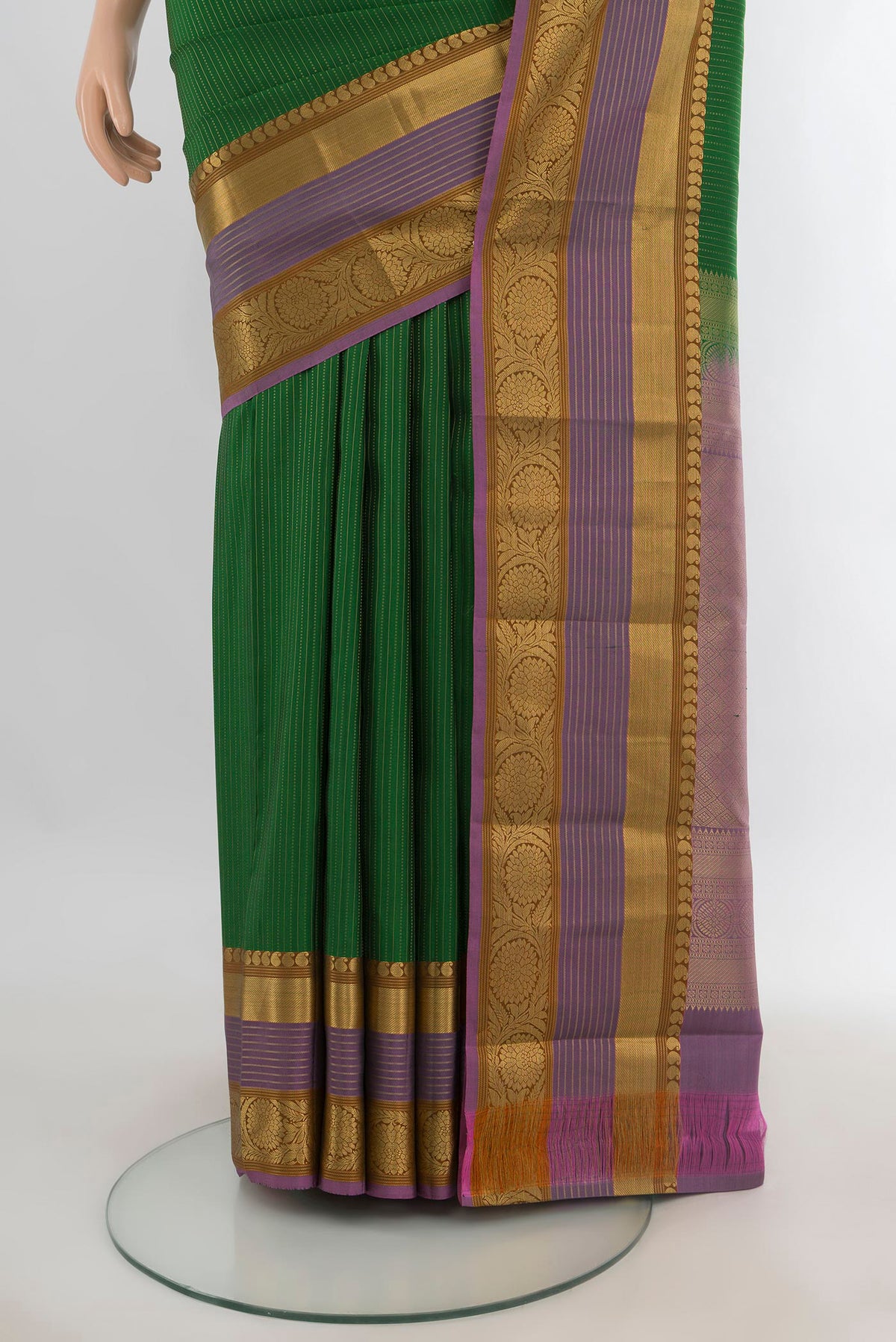 Pleats and pallu of Pure Silk Green Kanjivaram Saree with Stripes on the body and Zari Border. 