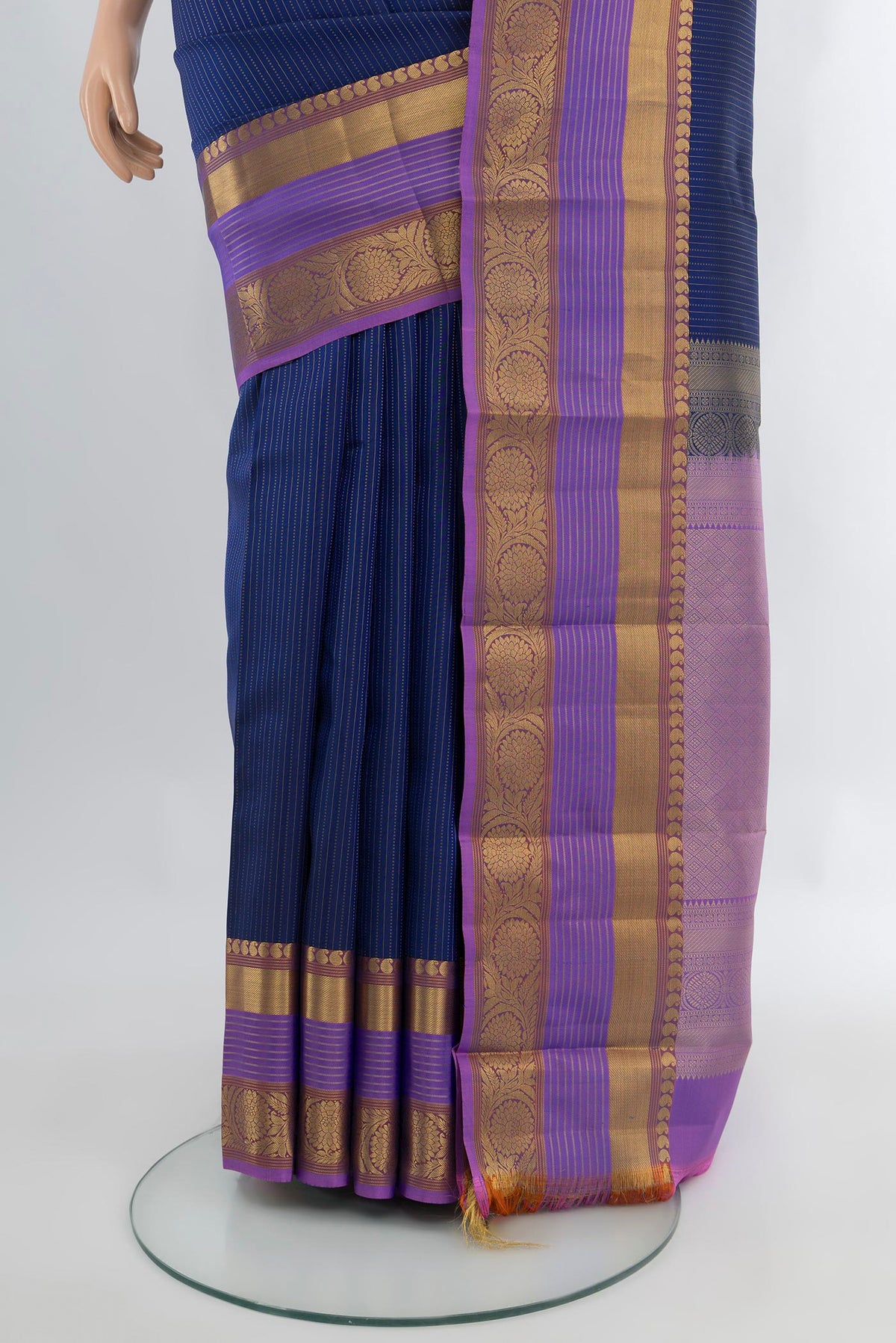 Pleats and pallu of Dark Blue Kanjivaram Silk Saree with Stripes on the body and Zari Border. 