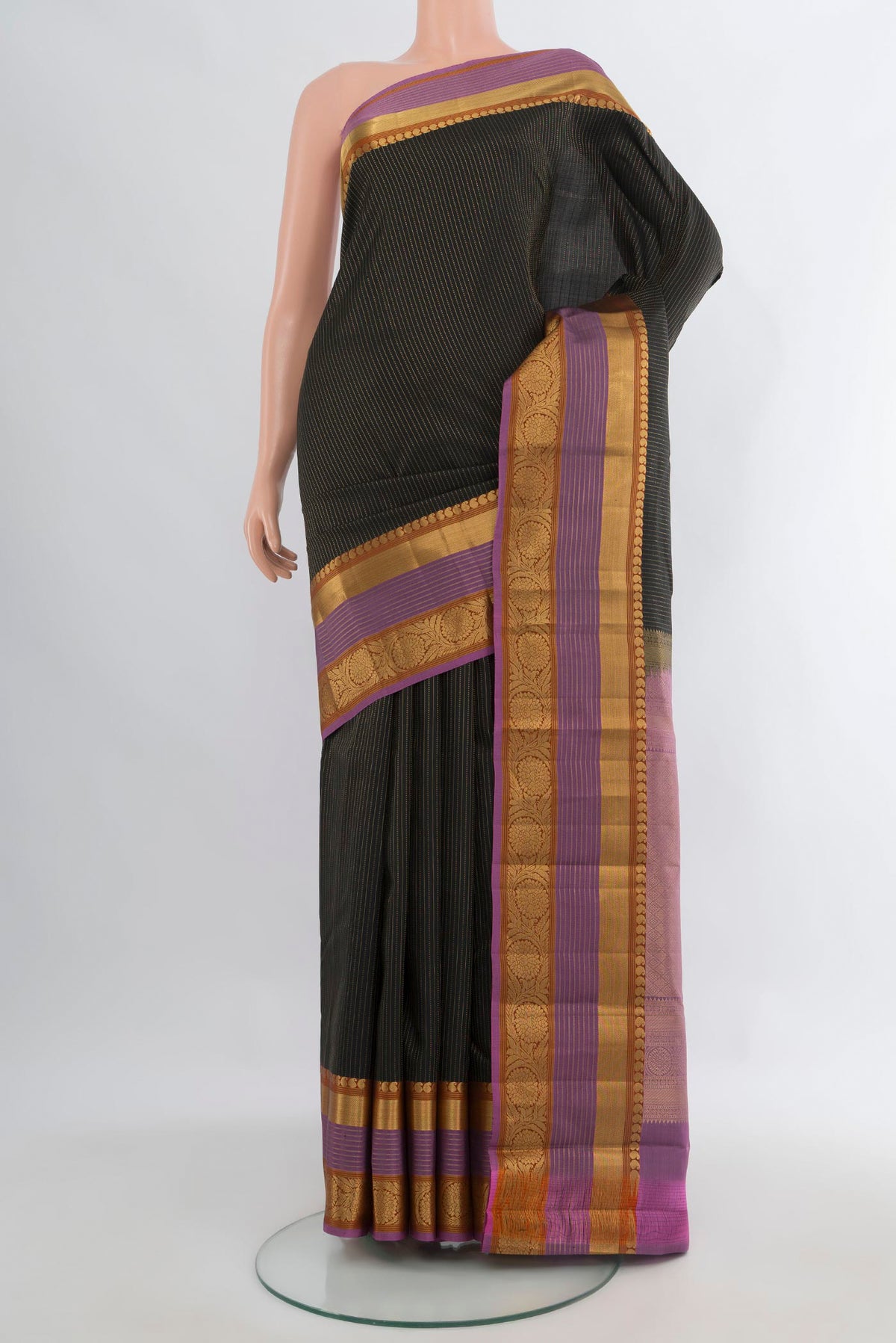 Pure Silk Black Kanjivaram Saree with Stripes on the body and Zari Border.  displayed on a mannequin