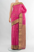 Rose pink Kanchipuram Silk Saree with Zari Butta on the body and Zari Border.  displayed on a mannequin