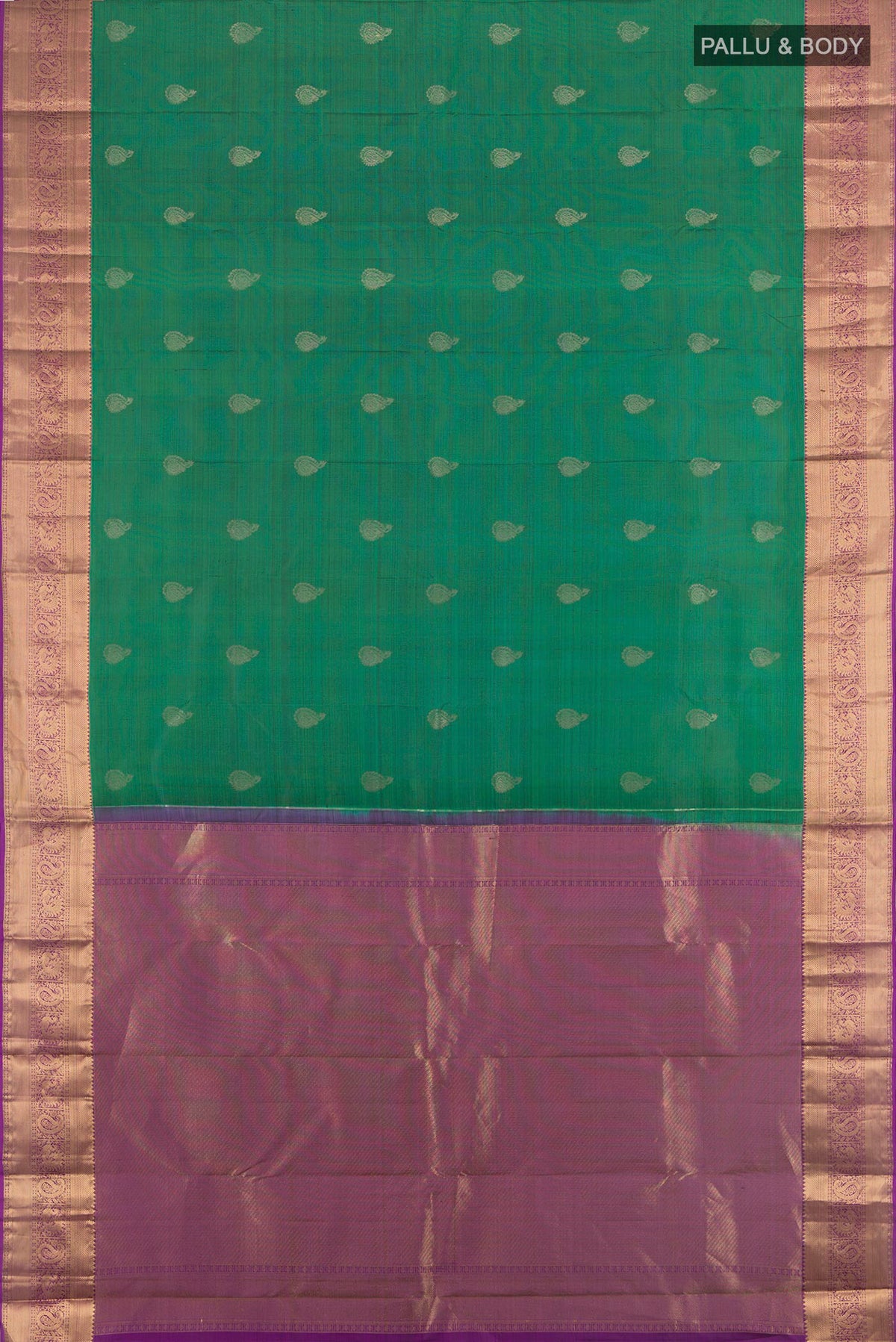 Flat view of Green Kanchipuram Silk Saree with Zari Butta on the body and Zari Border. 