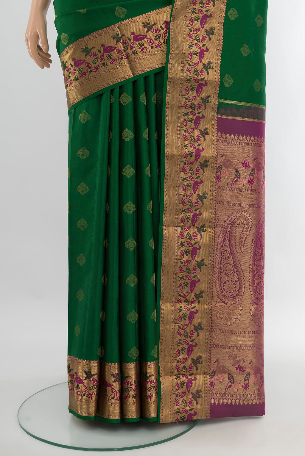 Pleats and pallu of Bottle Green Kanjivaram Silk Saree with Zari Butta on the body and Zari Border. 