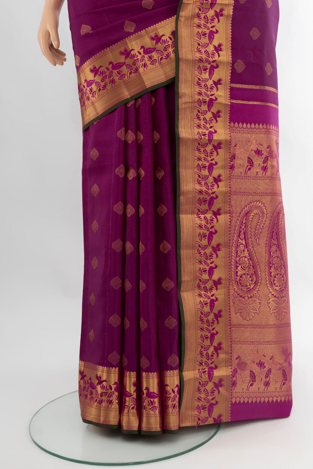 Pleats and pallu of Purple Kanjivaram Silk Saree with Zari Butta on the body and Zari Border. 