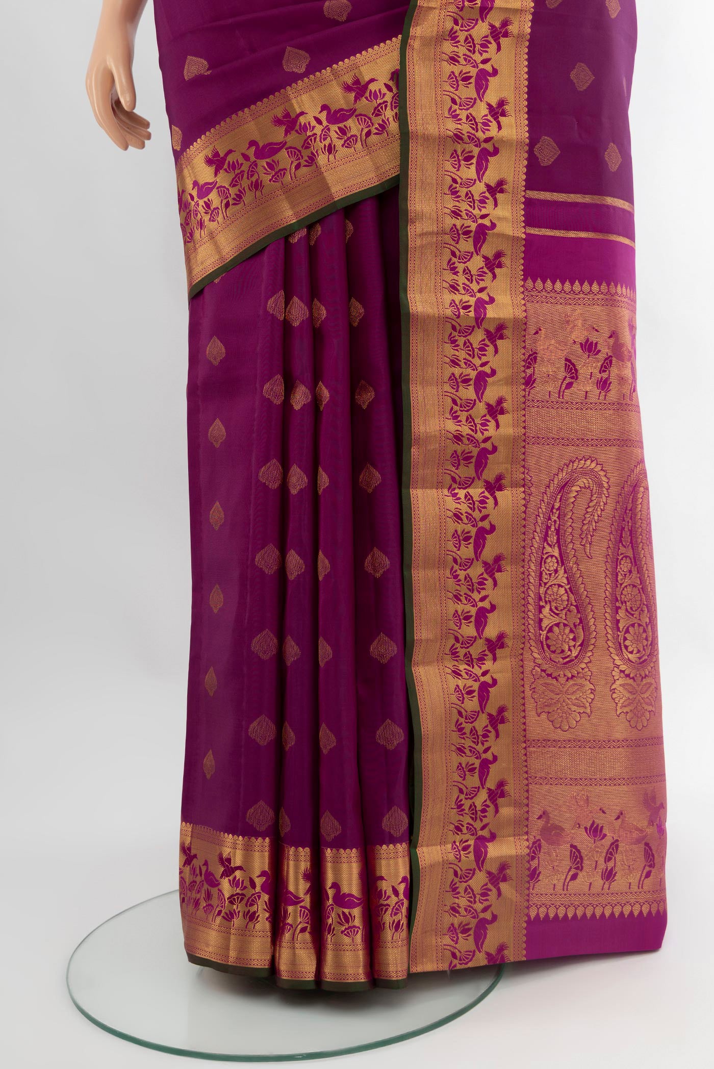 Pleats and pallu of Purple Kanjivaram Silk Saree with Zari Butta on the body and Zari Border. 