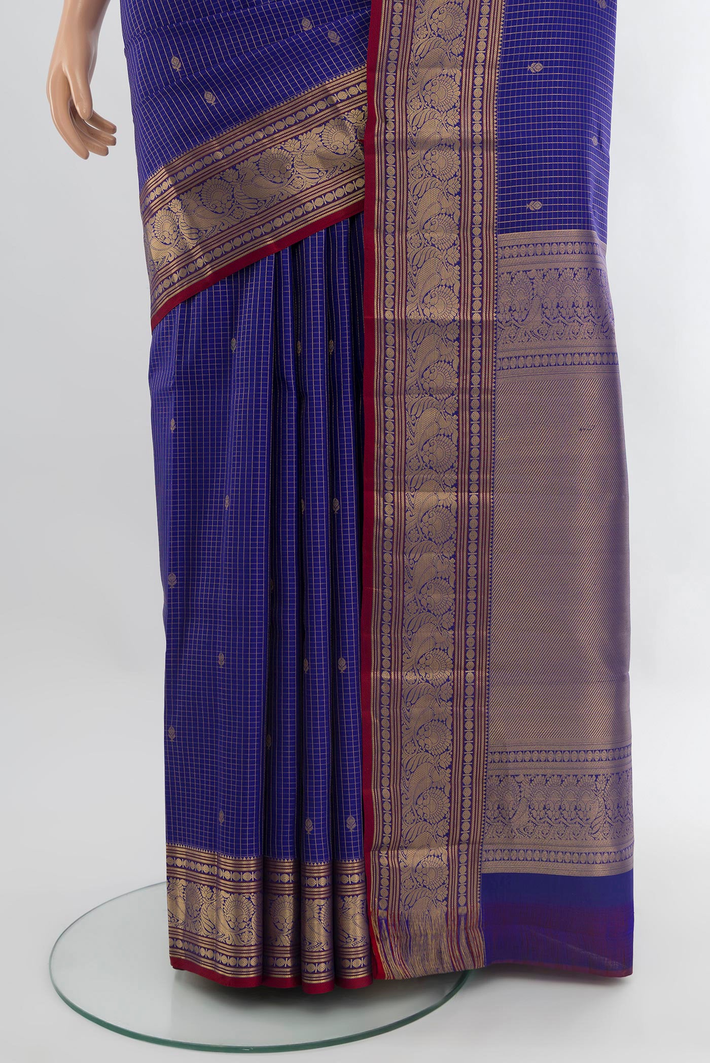 Pleats and pallu of Royal Blue Kanchipuram Silk Saree with Checked design on the body and Zari Border. 