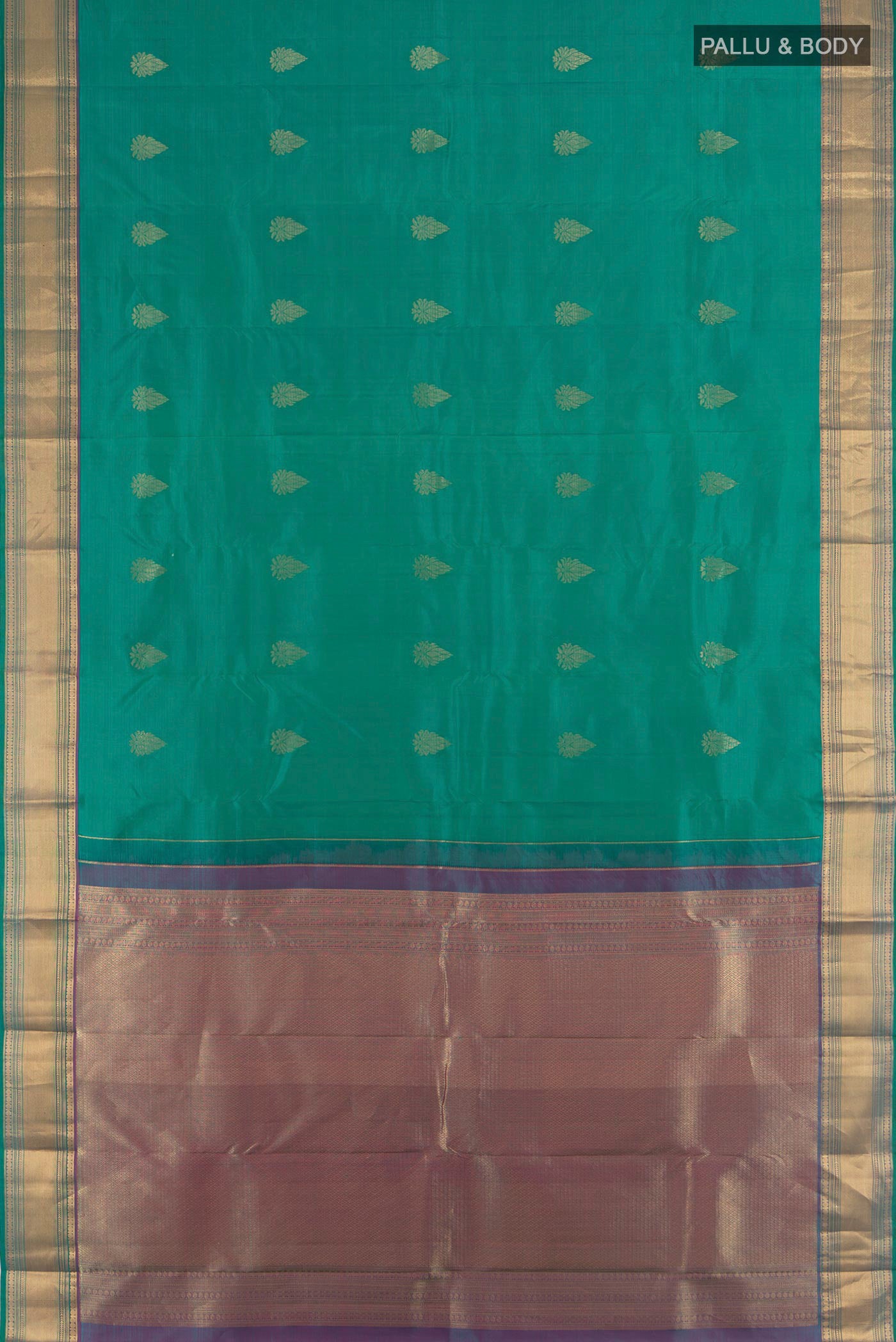 Flat view of Peacock Blue Kanchipuram Silk Saree with Zari Butta on the body and Silk Border. 