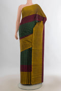 Pure Silk Bottle Green Kanchipuram Saree with Checked design on the body and Plain Border.  displayed on a mannequin