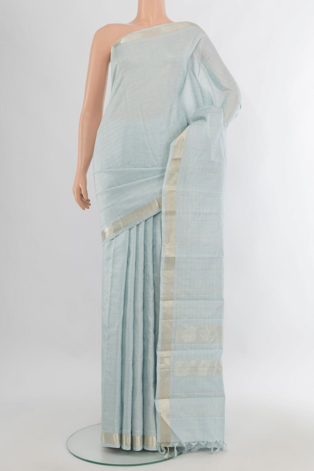 Pure Silk Light Blue Kanjivaram Saree with Stripes on the body and Zari Border.  displayed on a mannequin