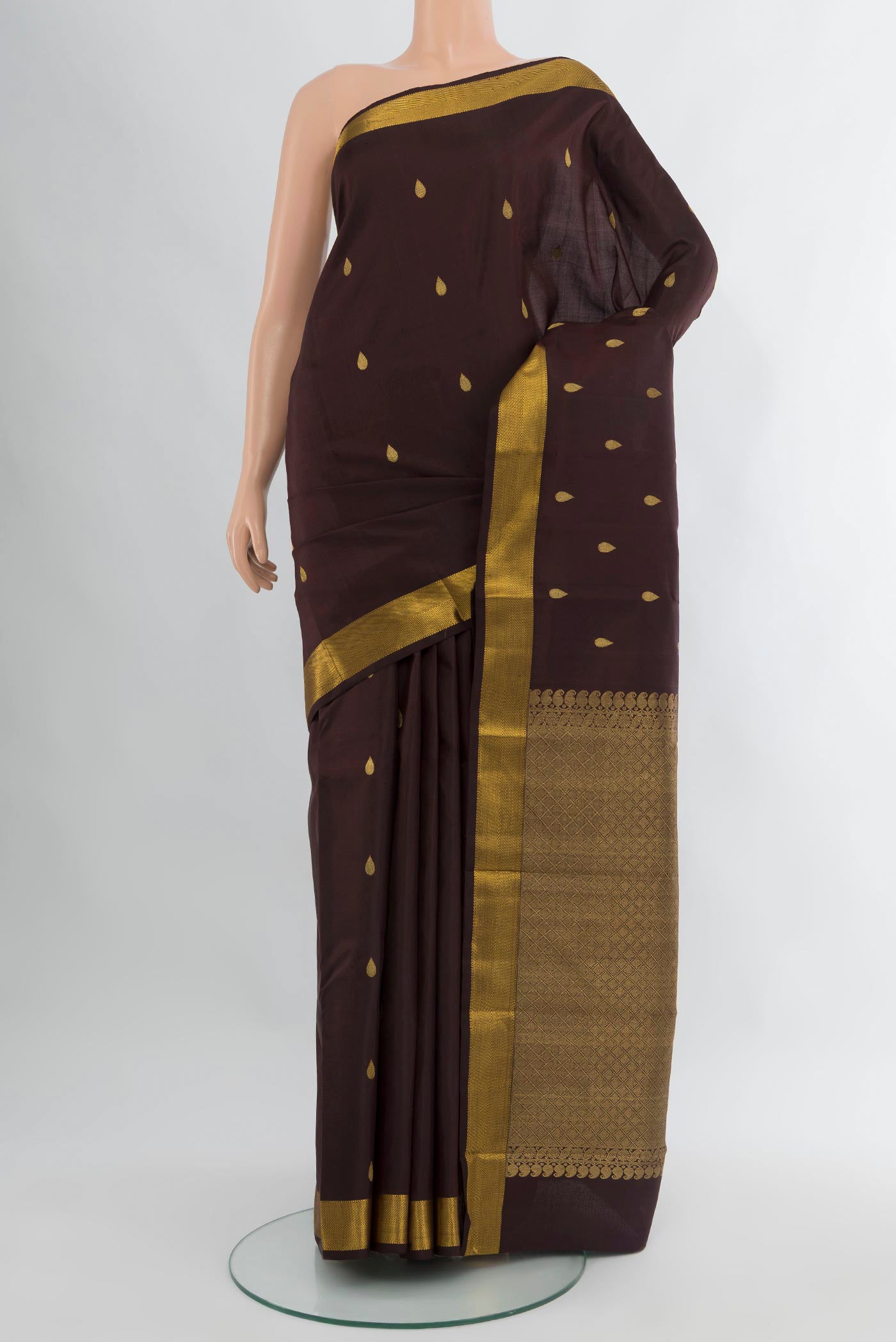 Coffee Brown Kanchipuram Silk Saree with Zari Butta on the body and Zari Border.  displayed on a mannequin