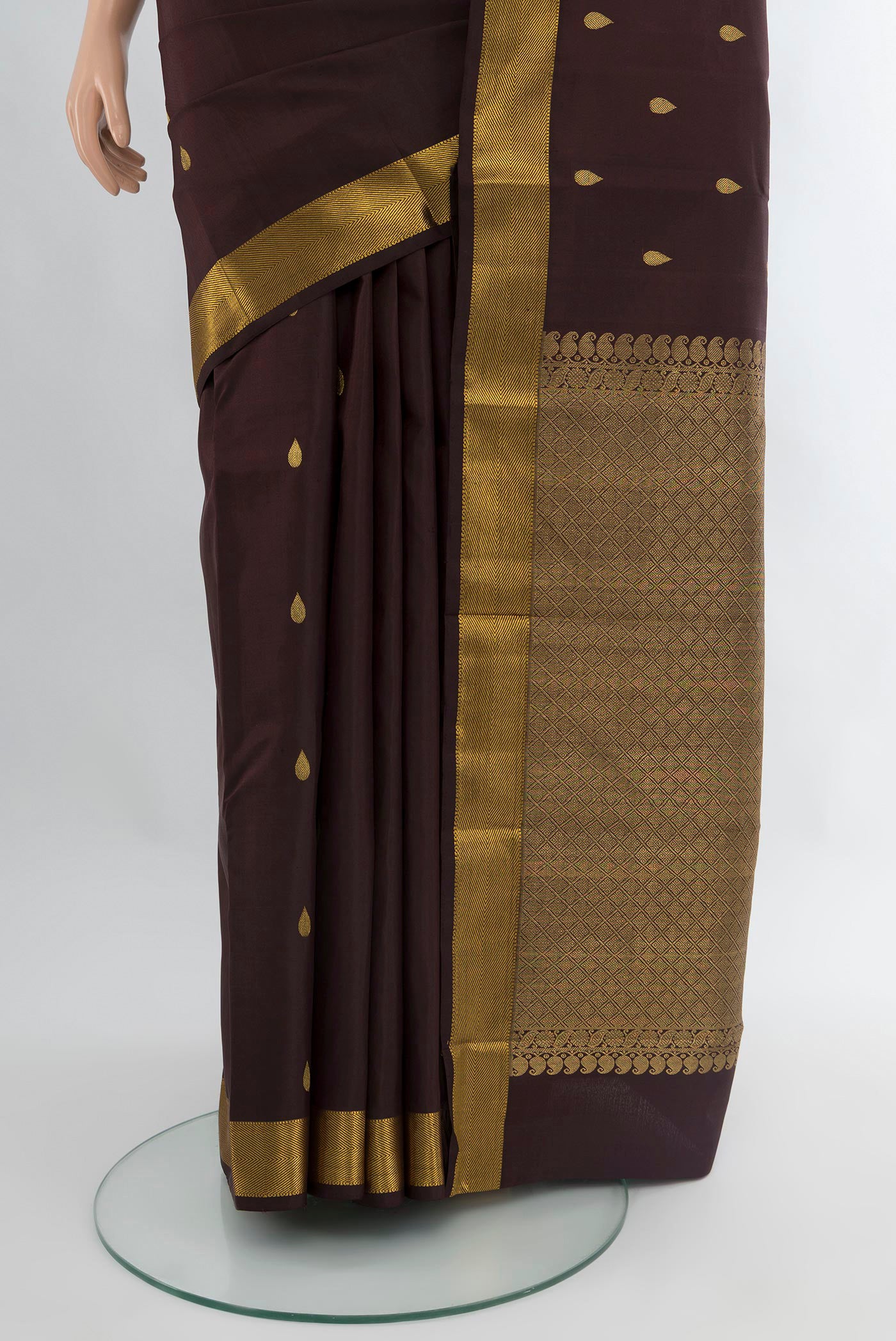 Pleats and pallu of Coffee Brown Kanchipuram Silk Saree with Zari Butta on the body and Zari Border. 