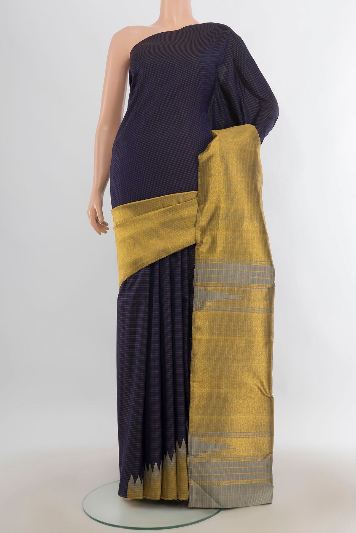 Pure Silk Navy Blue Kanchipuram Saree with Stripes on the body and Rising Temple Border.  displayed on a mannequin