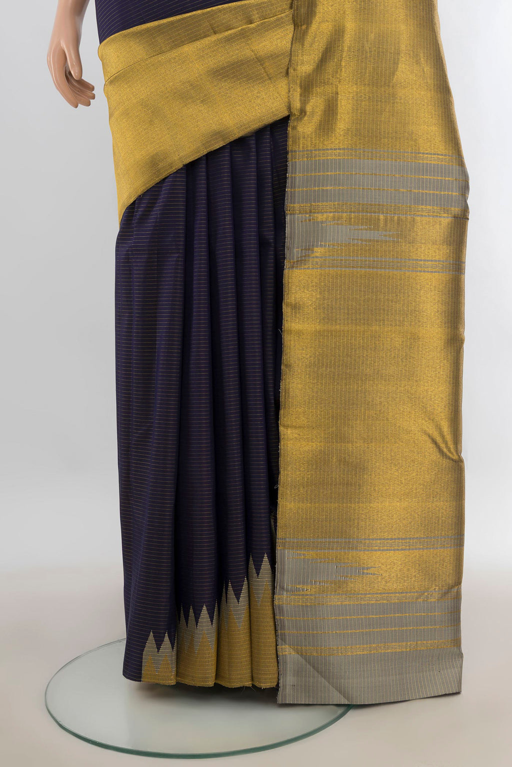 Pleats and pallu of Pure Silk Navy Blue Kanchipuram Saree with Stripes on the body and Rising Temple Border. 