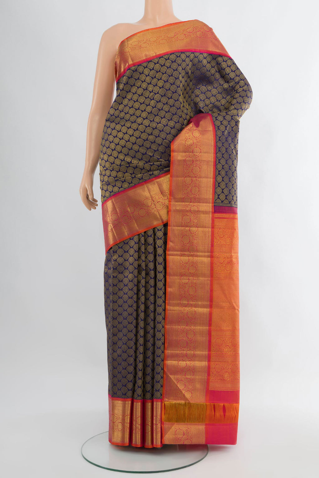 Navy Blue Kanjivaram Silk Saree with Zari Brocade on the body and Zari Border.  displayed on a mannequin