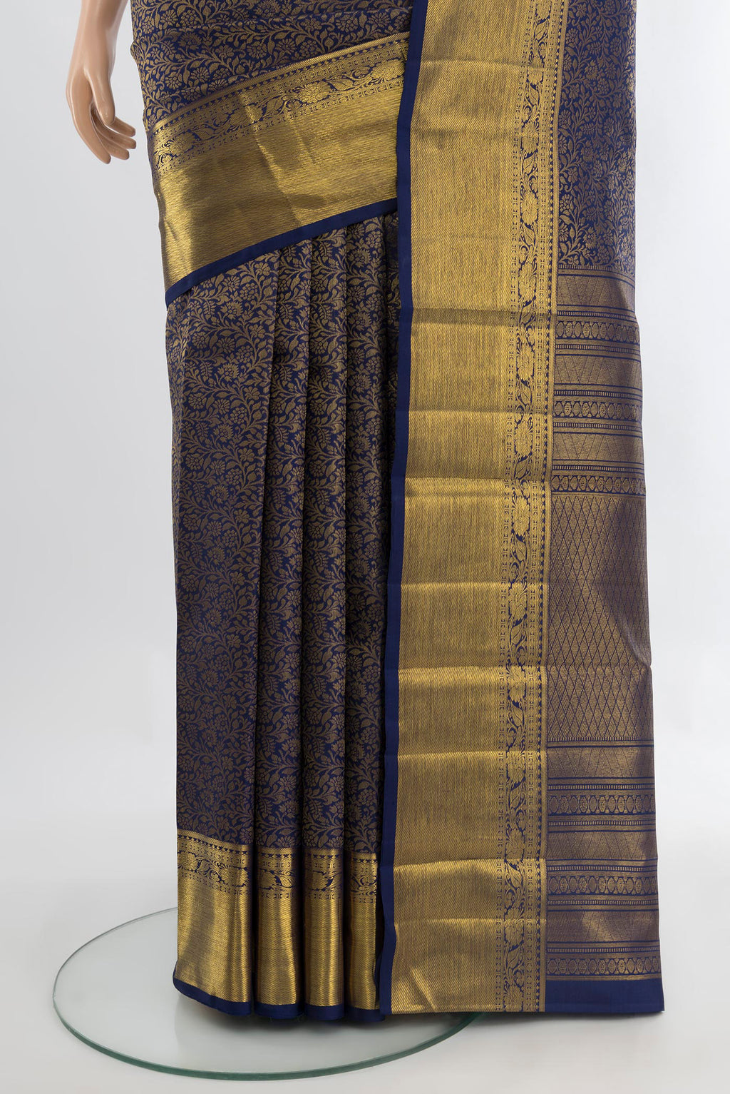 Pleats and pallu of Pure Silk Pure Zari Navy Blue Kanjivaram Saree with Zari Butta on the body and Silk Border. 