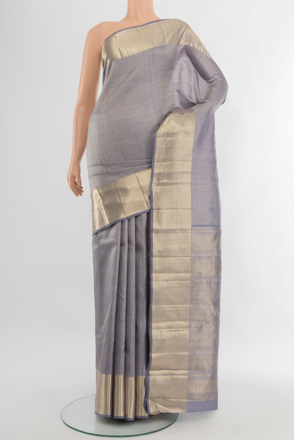 Lilac Kanjivaram Silk Saree with Zari Brocade on the body and Zari Border.  displayed on a mannequin