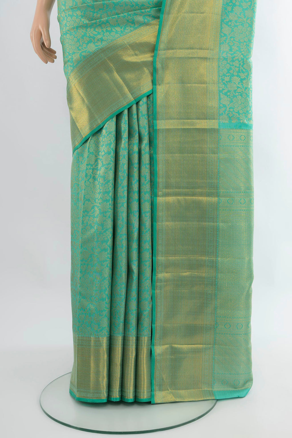 Pleats and pallu of Turquoise Kanjivaram Silk Saree with Zari Brocade on the body and Zari Border. 