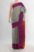 Pure Silk Davys Grey Kanchipuram Saree with Thread Butta on the body and Thread Border.  displayed on a mannequin