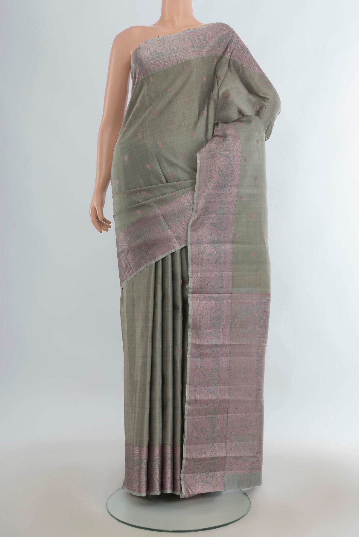 Pure Silk Davys Grey Kanchipuram Saree with Thread Butta on the body and Thread Border.  displayed on a mannequin