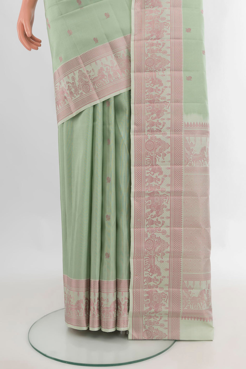 Pleats and pallu of Pure Silk Pista Green Kanchipuram Saree with Thread Butta on the body and Thread Border. 