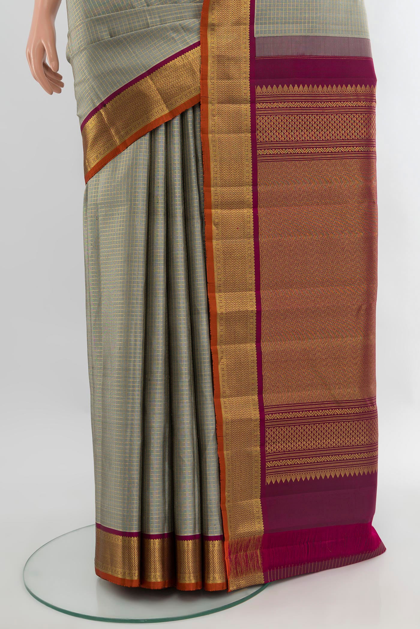 Pleats and pallu of Davys Grey Kanjivaram Silk Saree with Checked design on the body and Zari Border. 