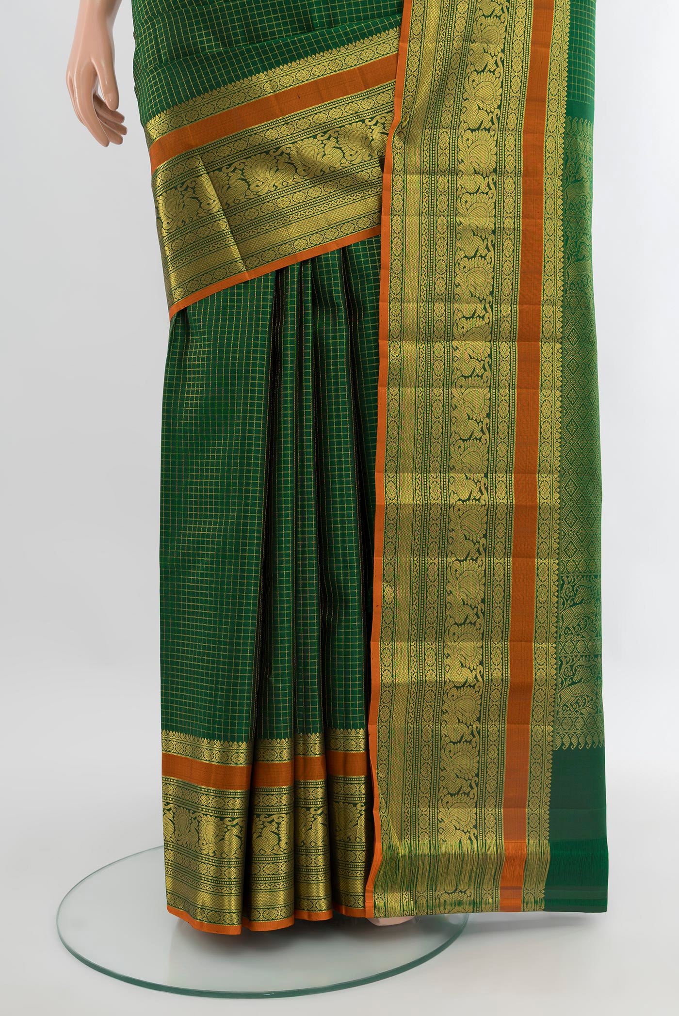 Pleats and pallu of Bottle Green Kanjivaram Silk Saree with Checked design on the body and Zari Border. 