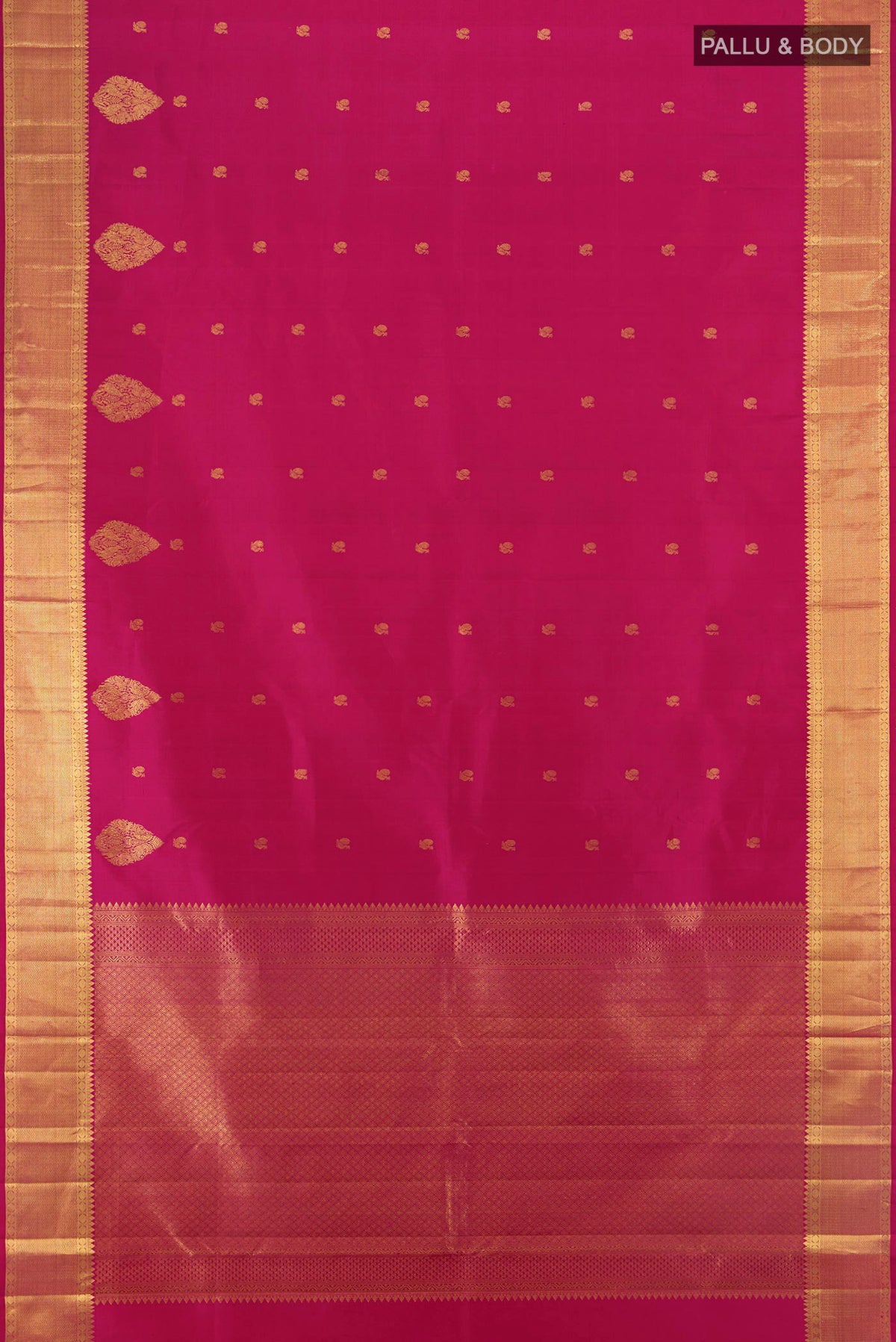 Flat view of Pure Silk Magenta Kanjivaram Saree with Zari Butta on the body and Zari Border. 