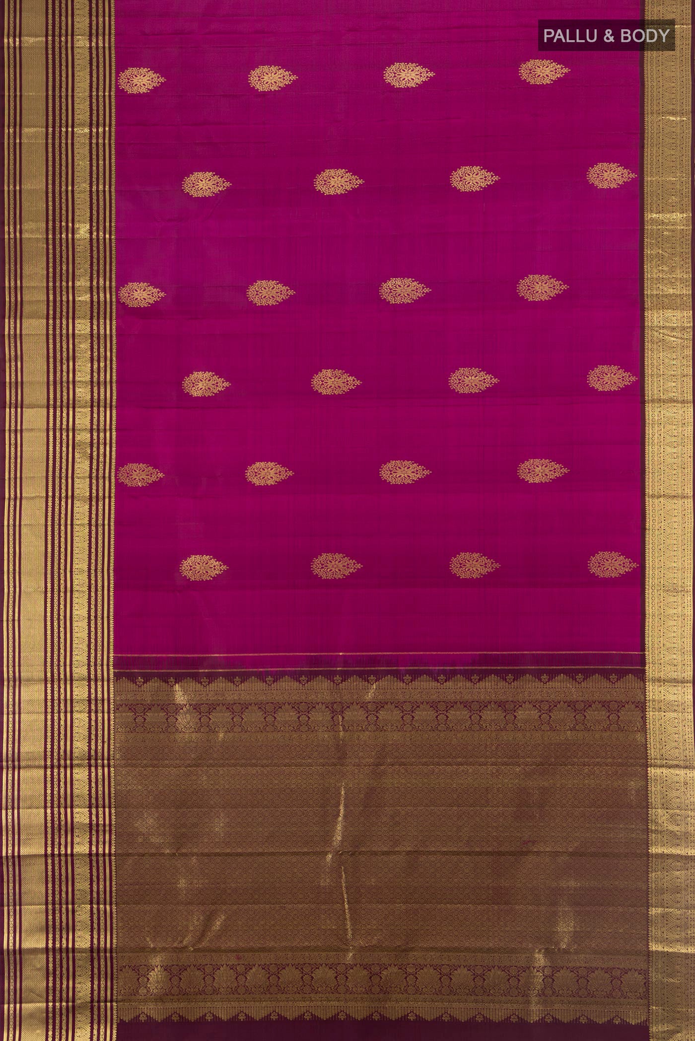 Flat view of Magenta Kanjivaram Silk Saree with Zari Butta on the body and Zari Border. 