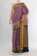 Pure Silk Lavender Kanjivaram Saree with Zari Butta on the body and Zari Border.  displayed on a mannequin