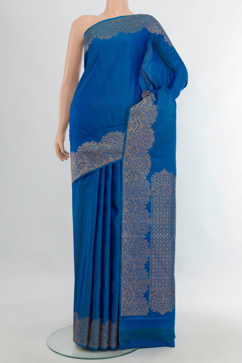 Pure Silk Blue Kanchipuram Saree with Plain Body and Fancy Border.  displayed on a mannequin