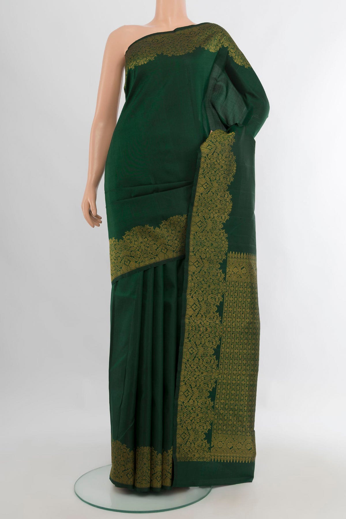 Pure Silk Bottle Green Kanchipuram Saree with Plain Body and Zari Border.  displayed on a mannequin