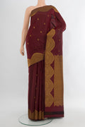 Coffee Brown Kanjivaram Silk Saree with Zari Butta on the body and Zari Border.  displayed on a mannequin