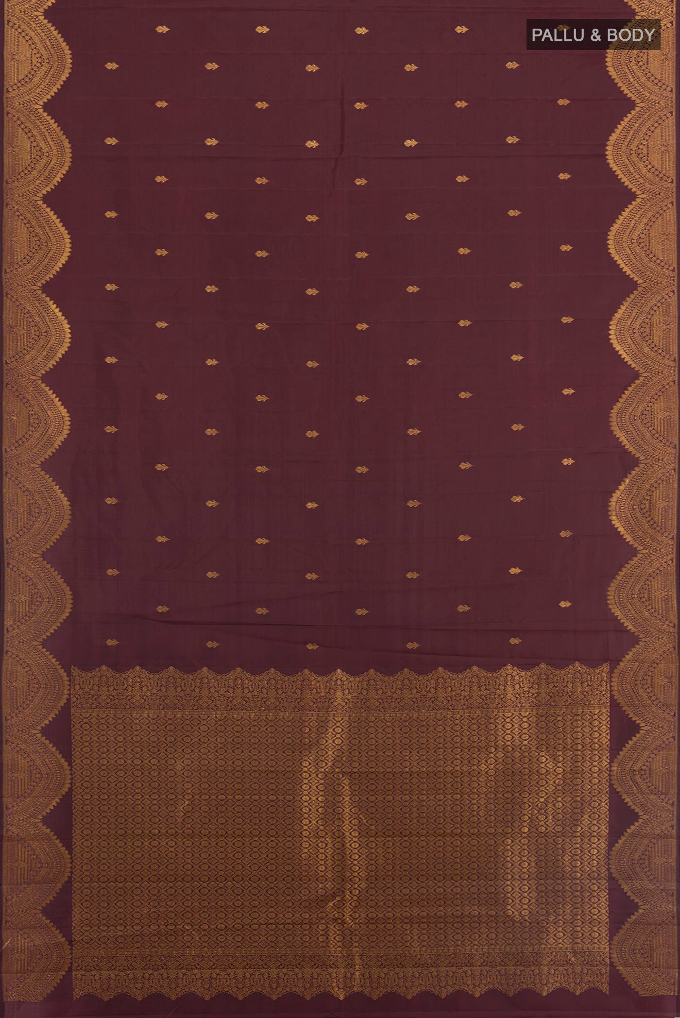 Flat view of Coffee Brown Kanjivaram Silk Saree with Zari Butta on the body and Zari Border. 