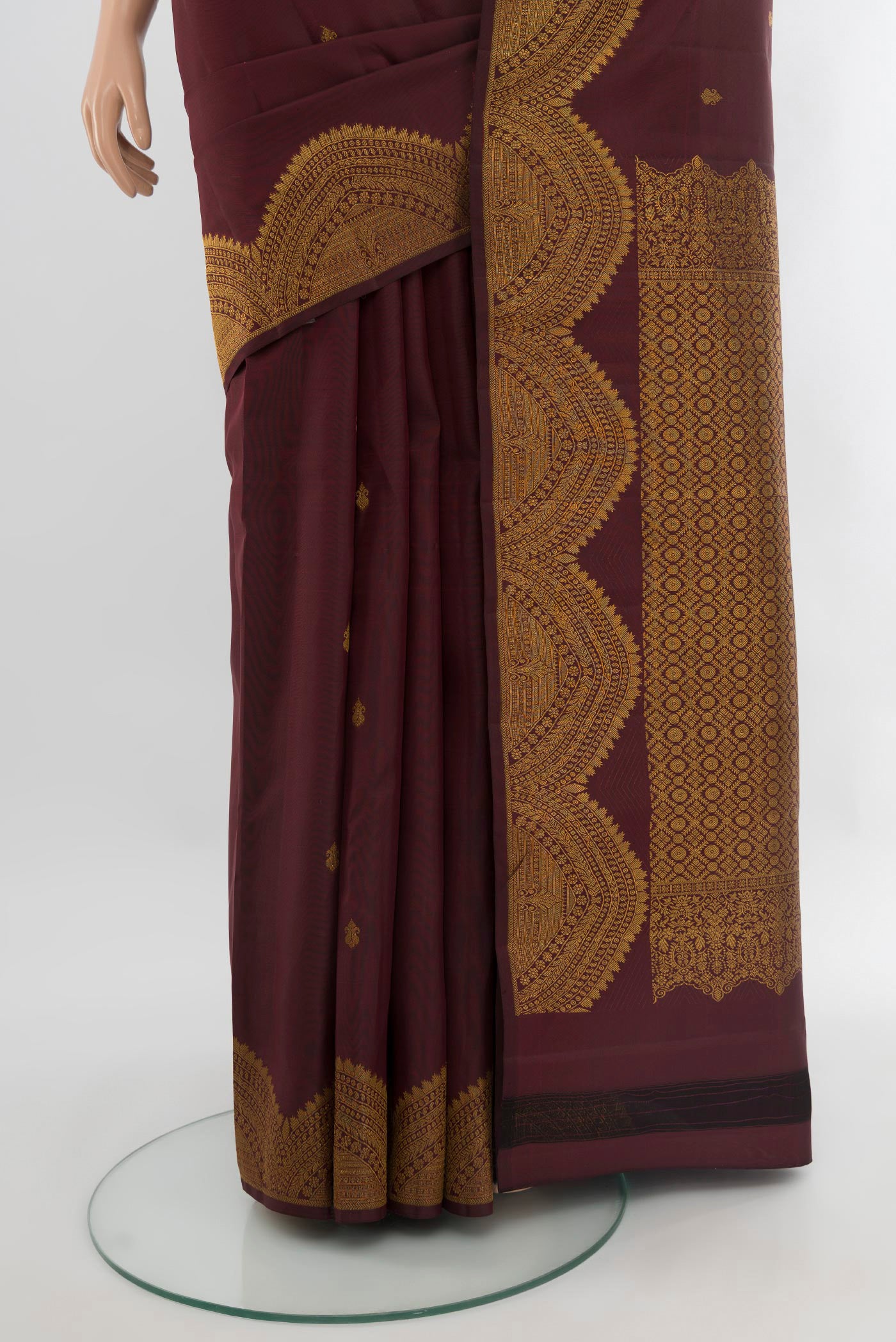 Pleats and pallu of Coffee Brown Kanjivaram Silk Saree with Zari Butta on the body and Zari Border. 