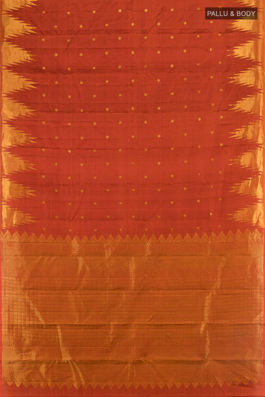 Flat view of Rust Kanchipuram Silk Saree with Zari Butta on the body and Temple Border. 