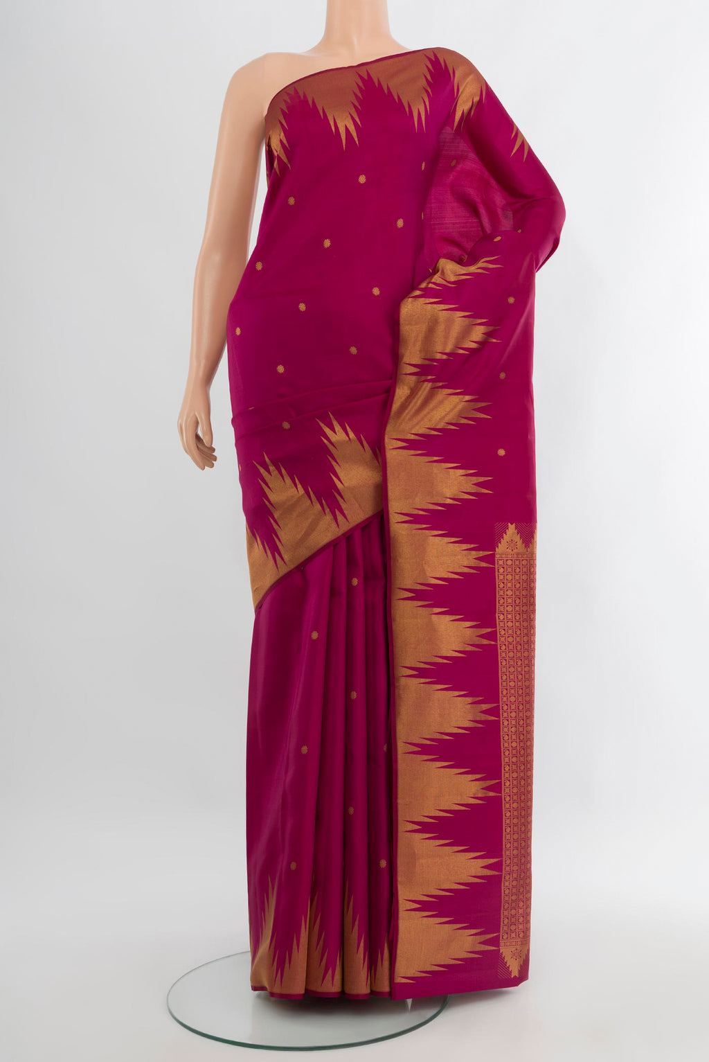 Magenta Kanchipuram Silk Saree with Zari Butta on the body and Temple Border.  displayed on a mannequin
