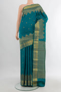 Pure Silk Peacock Blue Kanjivaram Saree with Zari Butta on the body and Fancy Border.  displayed on a mannequin
