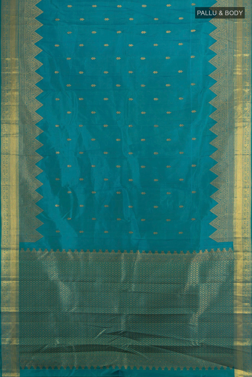 Flat view of Pure Silk Peacock Blue Kanjivaram Saree with Zari Butta on the body and Fancy Border. 