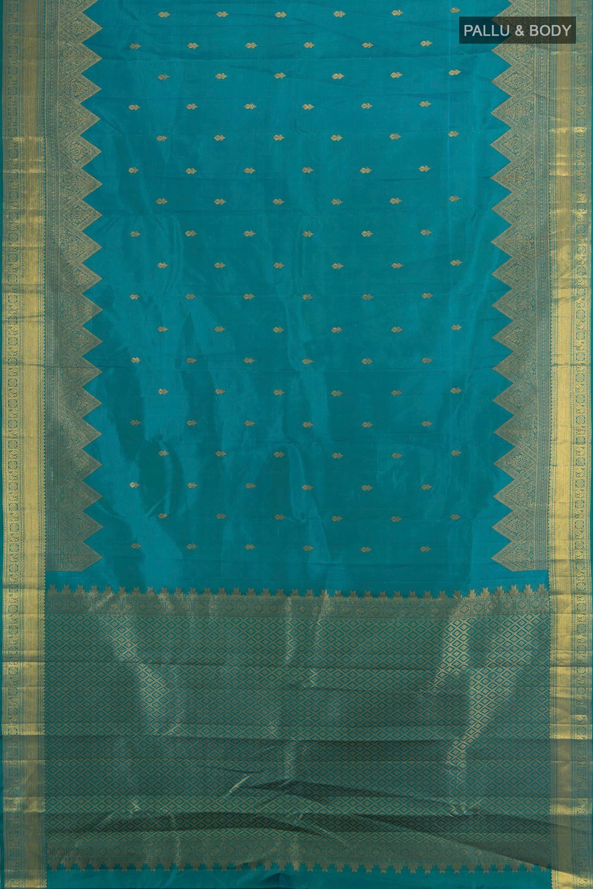 Flat view of Pure Silk Peacock Blue Kanjivaram Saree with Zari Butta on the body and Fancy Border. 