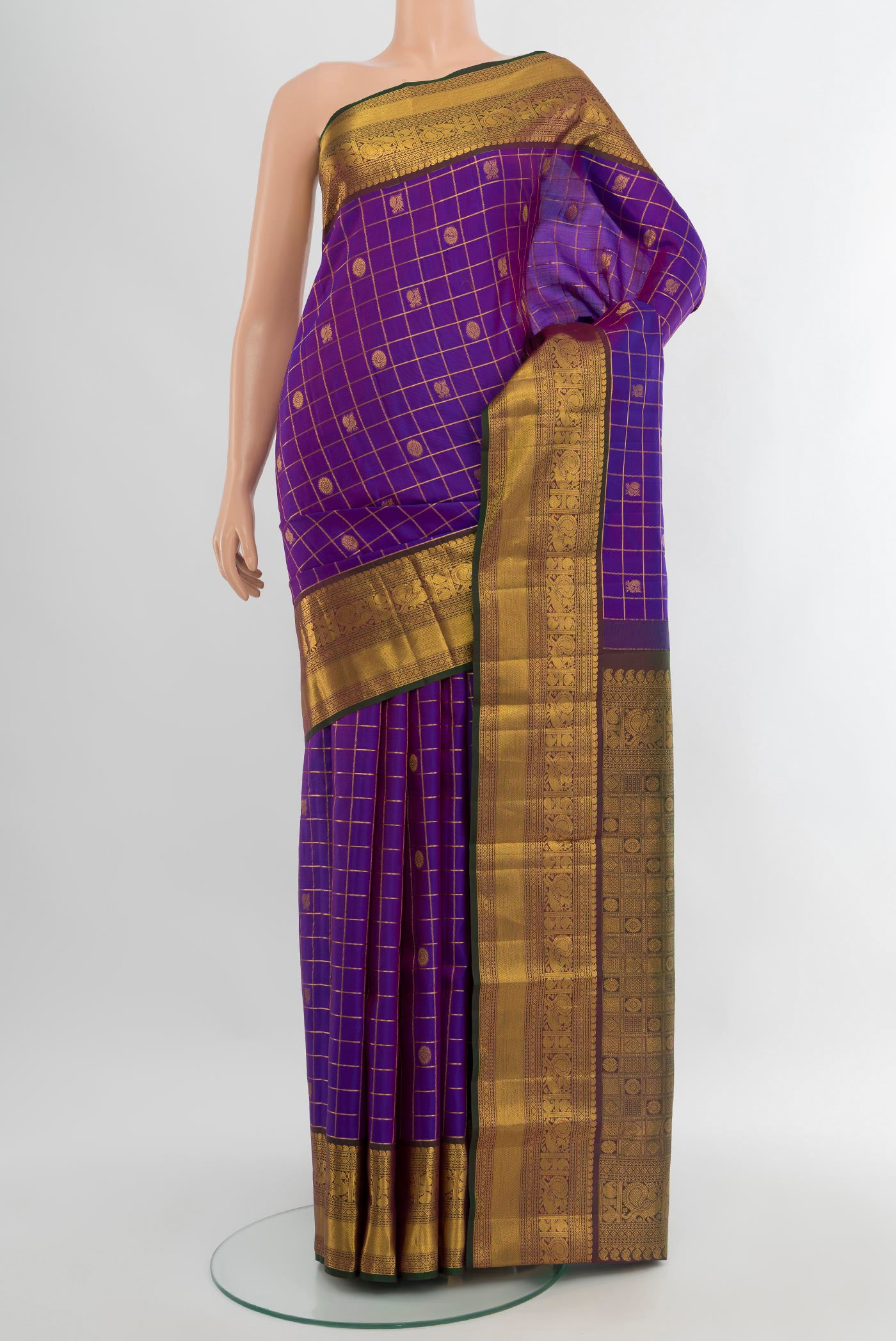 Purple Kanjivaram Silk Saree with Checked design on the body and Zari Border.  displayed on a mannequin