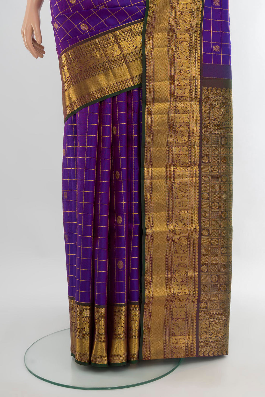 Pleats and pallu of Purple Kanjivaram Silk Saree with Checked design on the body and Zari Border. 