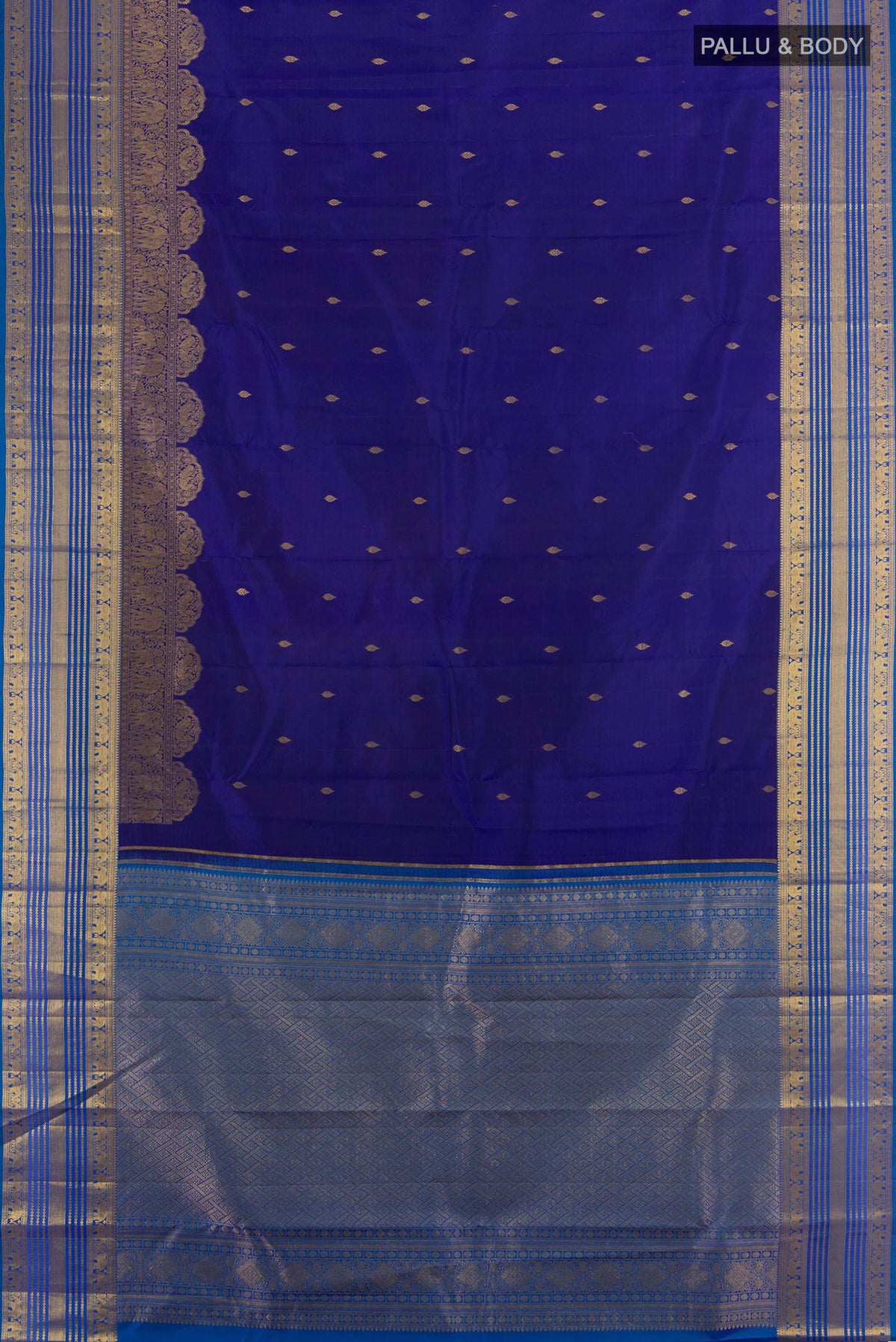 Flat view of Pure Silk Dark Blue Kanjivaram Saree with Zari Butta on the body and Zari Border. 