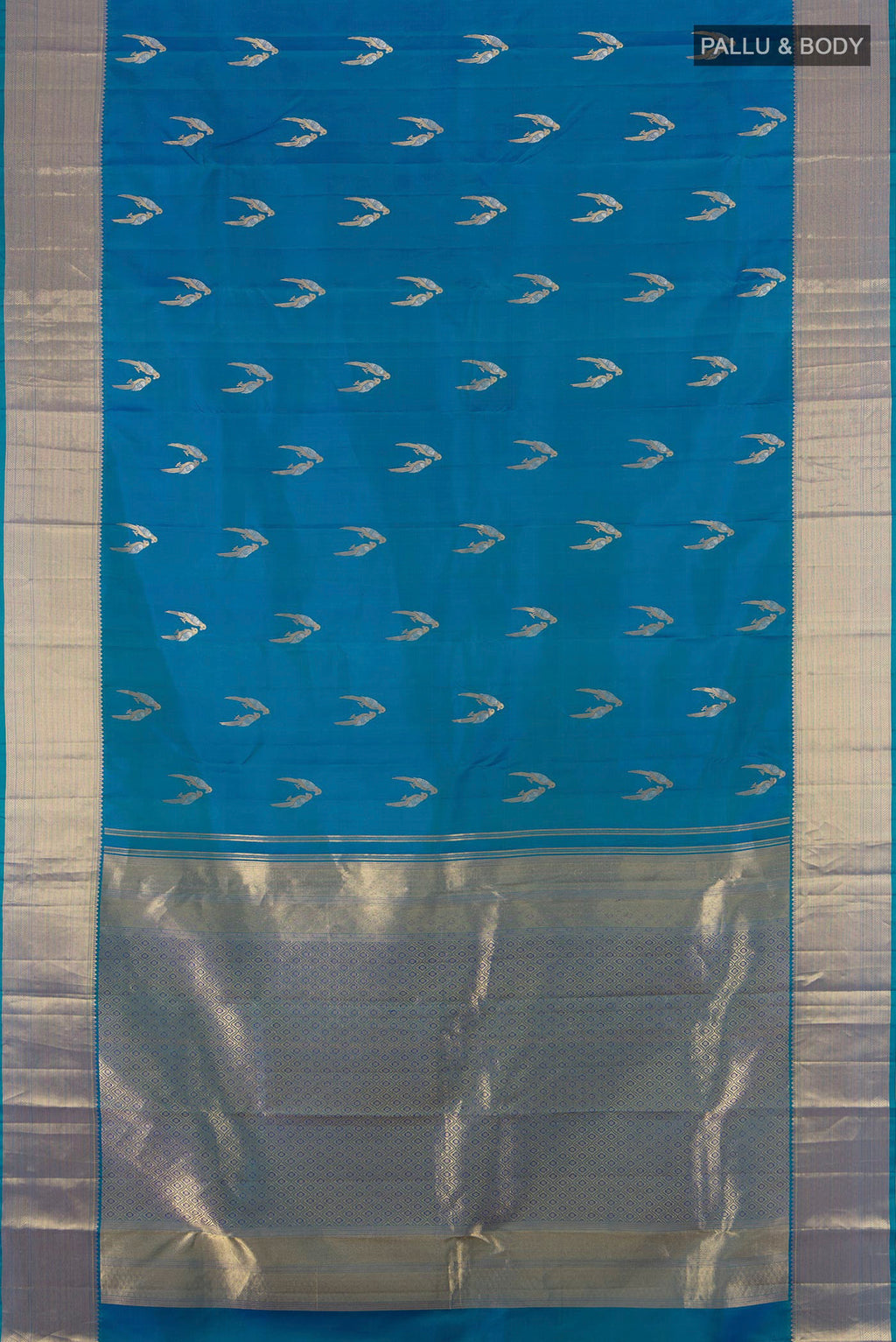Flat view of Pure Silk Blue Kanjivaram Saree with Zari Butta on the body and Zari Border. 