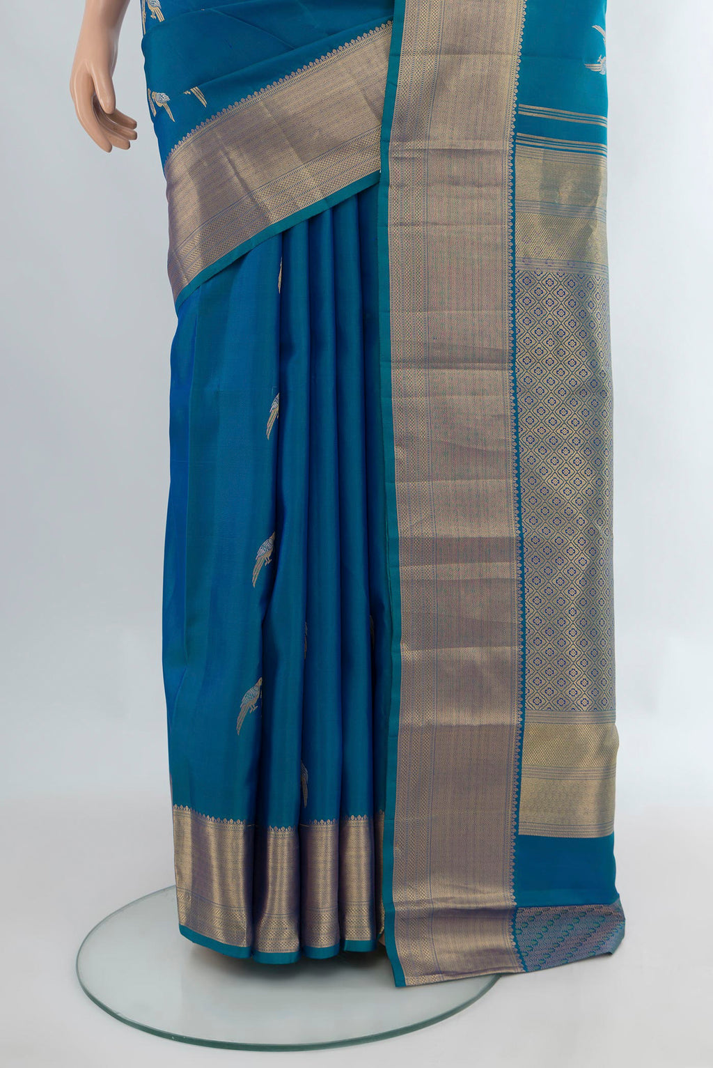 Pleats and pallu of Pure Silk Blue Kanjivaram Saree with Zari Butta on the body and Zari Border. 